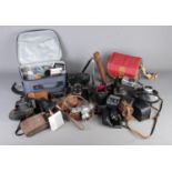 An assortment of vintage equipment; Including Bootsamica Auto Cds camera in case, Praktica MTL3