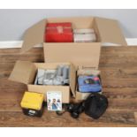 A box of assorted photography and film equipment to include boxed Canon Powershot SX30 IS camera,