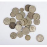 A 1916 George V silver half crown along with a good collection of post 1920, pre-1947 British half