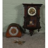 A Dupontic mantel clock with key and instruction manual along with an oak cased wall clock