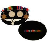 German WWII Third Reich cap badge, moulded mark '3 Ges Gesch' together with a set of British WWII