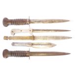 Two Dutch WWI / WWII Stormdolk commando fighting knives, together with three other knives without