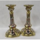 A pair of Royal Crown Derby 1128 Imari pattern candlesticks, height 7ins