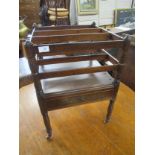 A 19th century mahogany canterbury with brass inlay decoration width 17ins height 25ins