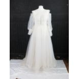 Vintage Ethereal Ivory lace tulle bridal dress with high neckline, bodice lace trim detail, bishop