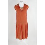 An Art Deco period lady's shift dress in coral pink, with hand stitched floral lace collar, c. 1920,