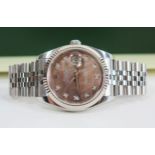 A ROLEX Oyster Datejust stainless steel automatic wristwatch, the 36mm case with diamond set hours
