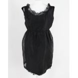 Belinda Bellville Boutique, London - vintage lady's black mini dress, having a mesh outer skirt