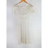 Early 20th century / Edwardian sheer lace dress in white, with short sleeves, capelet lace collar