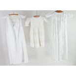 Three early 20th century child's christening gowns with cutwork decoration and machine lace edging