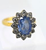 A good diamond and sapphire cluster ring, set in 18ct yellow gold, approx 4.5g, size L.
