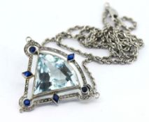 A aquamarine and diamond set pendant, also set with sapphire's, on a 14ct white gold chain, total