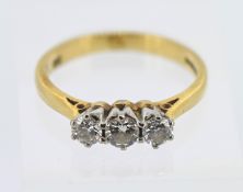 A three stone diamond set ring, approx 0.55ct, set in 18ct yellow gold, approx 3g, size L.