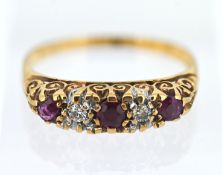 A ruby and diamond five stone dress ring, set in yellow gold (hallmark indistinct), approx 2.5g,
