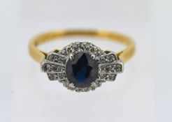 A diamond and sapphire dress ring, set in 18ct yellow gold and platinum, with inscription to the