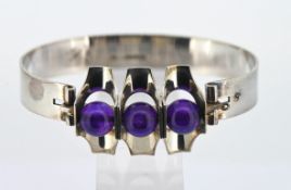 A silver and amethyst bangle possibly by Kultaseppa Salovaara, hallmarked 925, approx 32.7g.