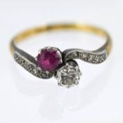 A ruby and diamond twist style set ring, set in 18ct yellow gold, approx 2.5g, size K.