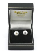 A pair of 9ct yellow gold oblate spheroid grey culture pearl studs, boxed.