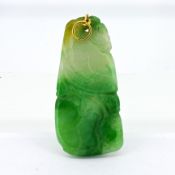 A jade stone pendant, length 5cm.