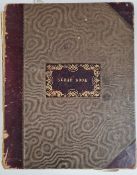 An antique scrapbook, to include poetry, world costume fashion plates, etchings,