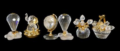 Swarovski Crystal Memories to include Classics Elephant (253446), Secrets Flower Basket (235917),