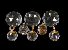 Swarovski Crystal to include:- Three Diamond Cut Multi Coloured Paperweights, three Place Card