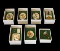 Swarovski Crystal Memories Daffodil Brooch (199431), Birthday cake with gold detail (191602),