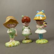 Beswick set of Joan Walsh Anglund children comprising 2 girls and boy. (3)
