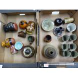 A good collection of studio pottery, including jugs, vases, a chamberstick holder, decanter and
