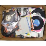 A collection of 7" vinyl records to include Diana Ross, The Police, Stevie Nicks, Wham and Tom Jones