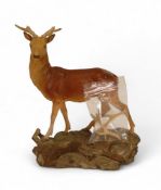 Beswick Large Stag displayed on a decorative uneven landscape plinth, matte finish (antlers are