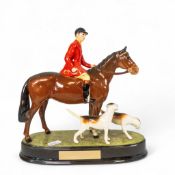 Beswick model of a Huntsman and Hounds on an oval base, titled Moving Off, r.