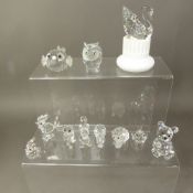 A collection of Swarovski Crystal small animal figures including Owl, Rhino, Squirrel, Cockrel,