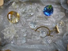 Crystal and glass items to include a Caithness paperweight, Swarovski faceted paperweight, Swarovski