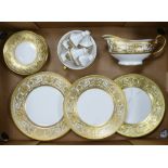 De Lamerie Fine Bone China, a selection of heavily gilt dinnerware to include gravy boat, plates,