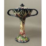 Moorcroft bonbonniere and cover in the Minuet pattern, 2005, height 21.5cm.