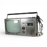 Sharp, 12P-29H IC solid state TV/radio/cassette recorder. Untested. (H: 27.5cm x L: 53cm x W: 31cm)