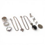 A collection of Silver jewellery including wedding ring, rings, crosses, pendant and chain etc,
