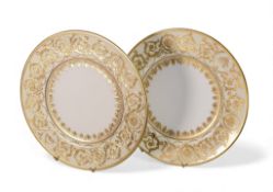 De Lamerie Fine Bone China, heavily gilt plates with decorative banding on white ground. Made in