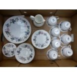 Royal Worcester tea set in the June Garland pattern, 1 cake plate, 8 tea cups, 8 saucers, 6 side