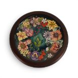A Moorcroft Charger in the Carousel design by Rachel Bishop, in wooden surround, number 271,
