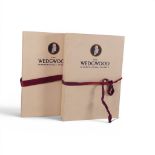 Two Wedgwood International Society Membership packs, each to include China Trays with designs of