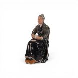 A Royal Doulton Figure , The Cup of Tea HN 2322, height 17cm.