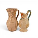 Two Pottery jugs to include A Newport pottery jug in the Celtic Harvest pattern by Clarice Cliff ,