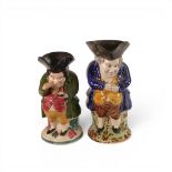 Two late 19th Century Toby Jugs, to include a Staffordshire Jug an a North Country Snuff Taker ,