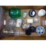 A mixed collection of items to include a clear glass oil lamp, Satsuma style egg on a hardwood