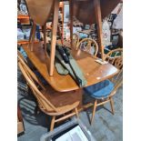 Ercol elm refectory style table 152cm and a set of 8 stick back kitchen chairs, also by Ercol (1 mis
