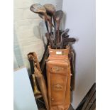 Old Golf clubs, tennis racket and sundry