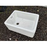 A rectangular glazed ceramic belfast sink with integral overflow. (24in x 18in x 10in)