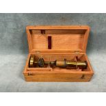 A French C19th mahogany cased brass microscope. (7.5in)